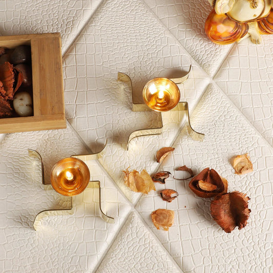 Golden Sleeping Satiya Diya | Brass Swastik Tealight Holder